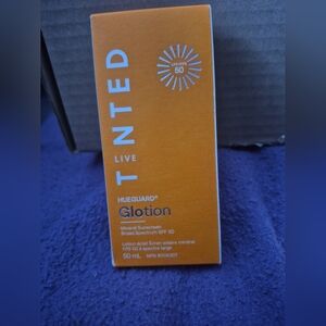 TINTED Live Hueguard Glotion Mineral Sunscreen Broad Spectrum SPF 50. Deep/Mediu
